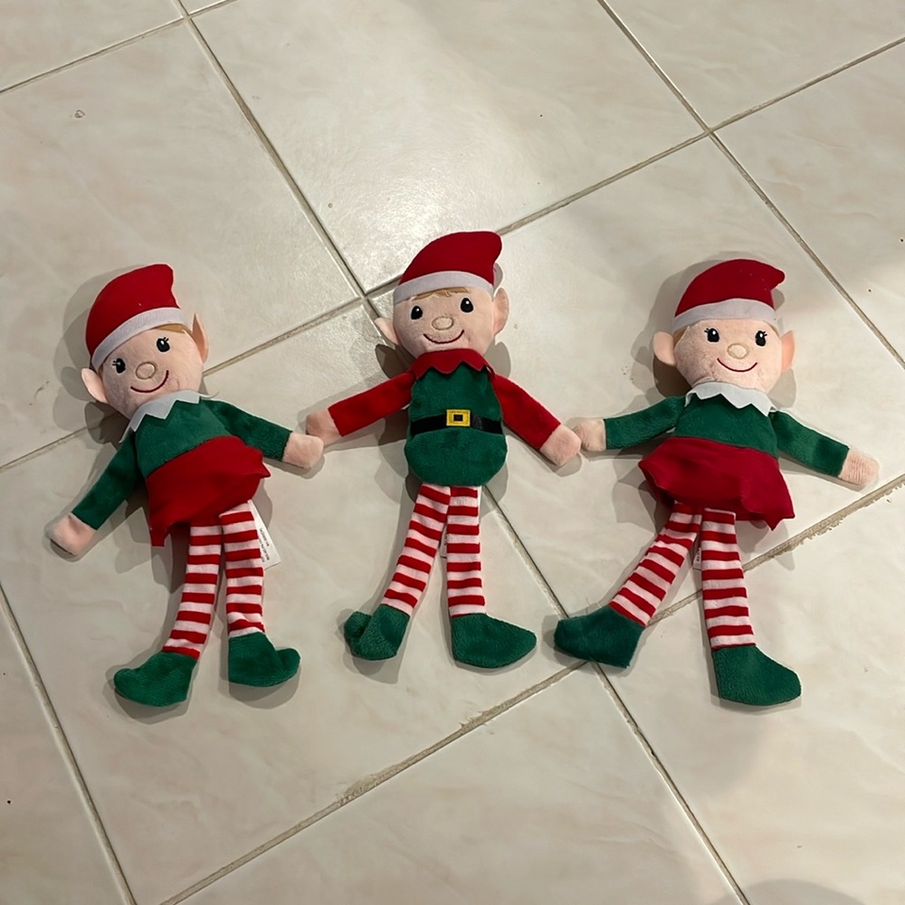 3 stuffed elf toys
